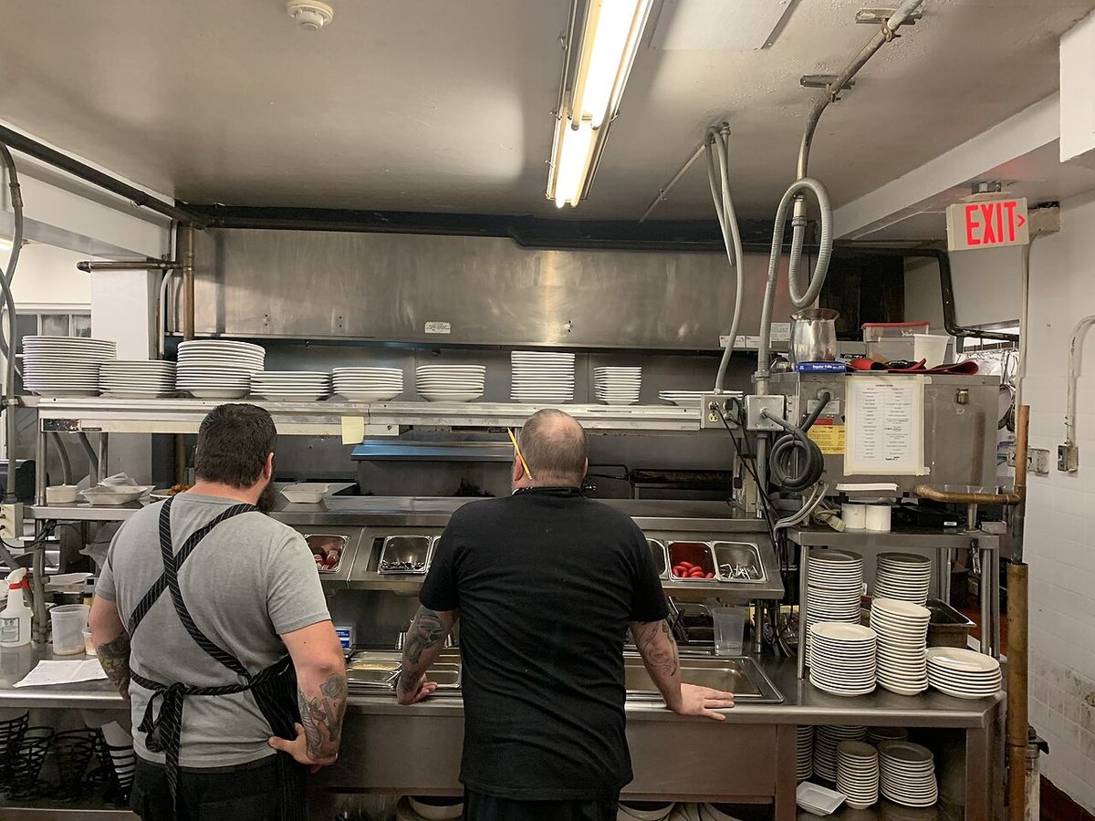 A busy commercial restaurant kitchen